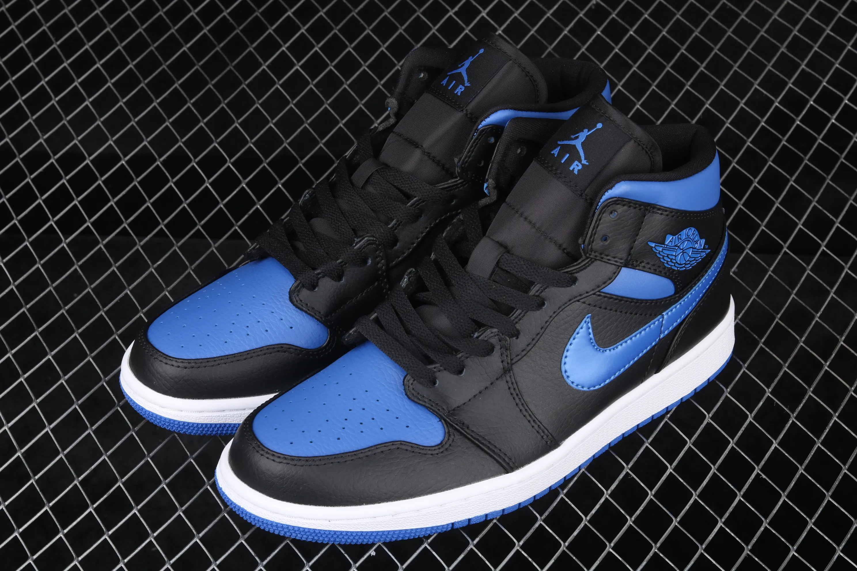 All categories Air Jordan Jordan series basketball shoes Air Jordan 1 Mid Air Jordan 1 Mid AJ1 Joe 1 mid-top black and blue basketball shoes 554724-068